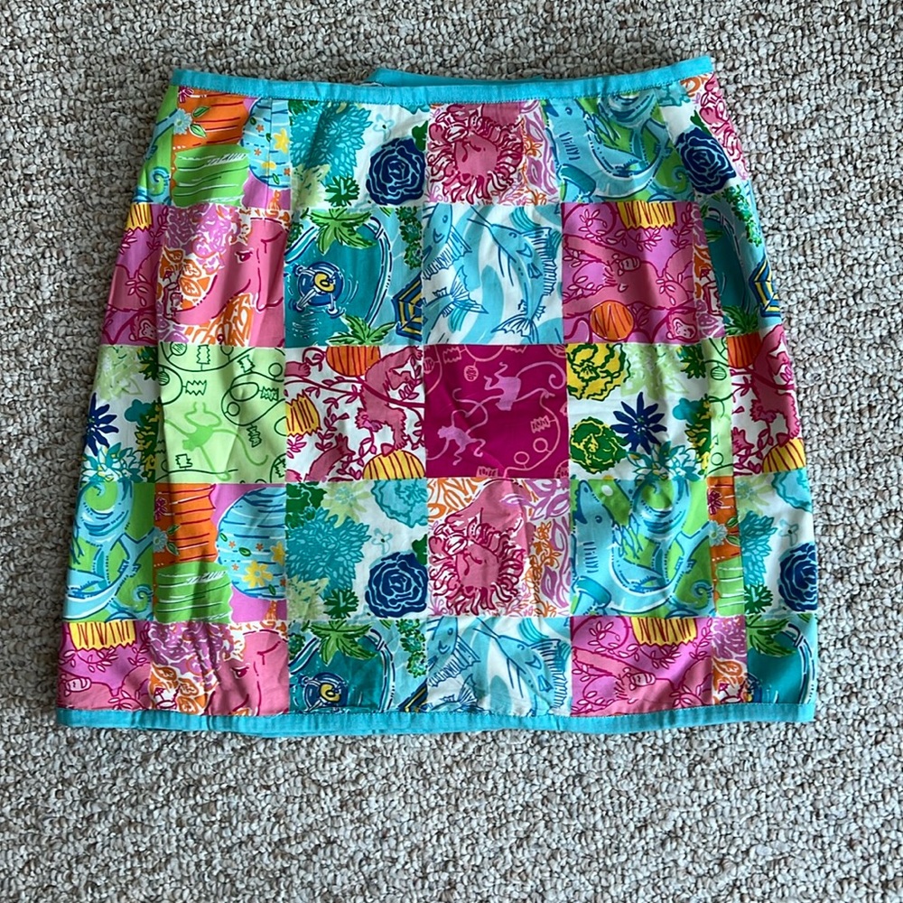 Lily Pulitzer colorful reversable skirt, size 4. Cotton, button fastener.